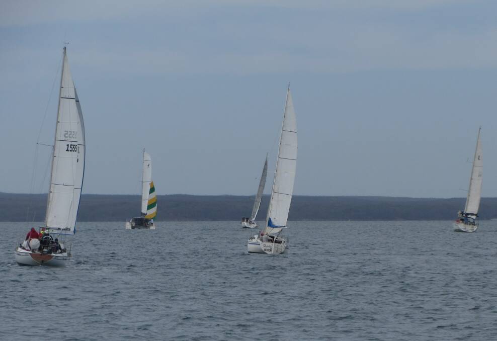 And they're racing:  The race fleet heads south down Jervis Bay during JBCYC’s first Round the Bay race of the season. 