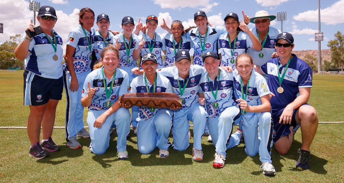 Naomi Woods (front row, third from left) and her NSW team. Photo: CRICKET AUSTRALIA