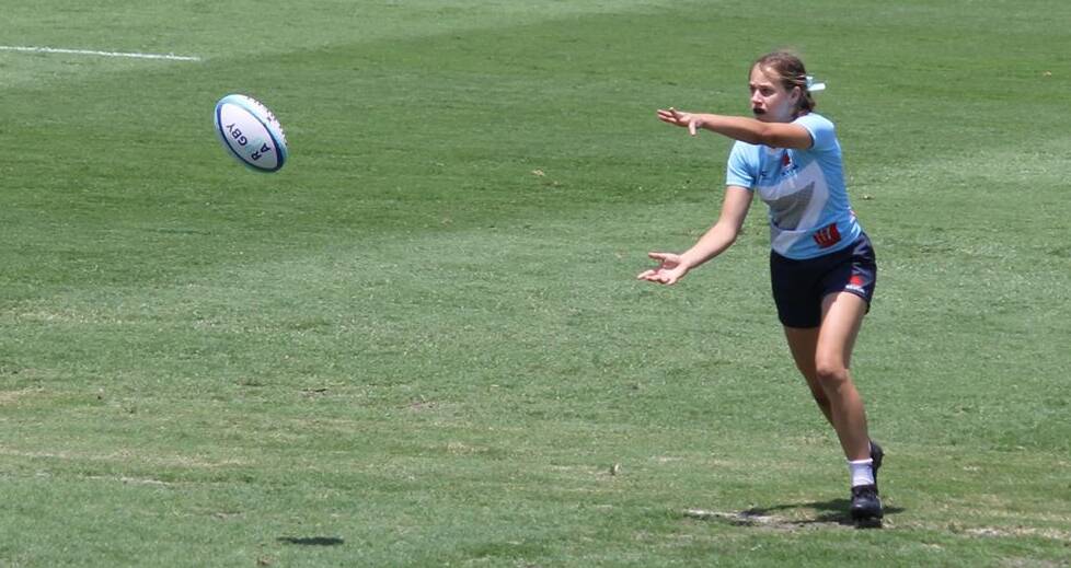 Aroha Spillane makes a pass for NSW at the recent nationals. Photo: KARINA SPILLANE