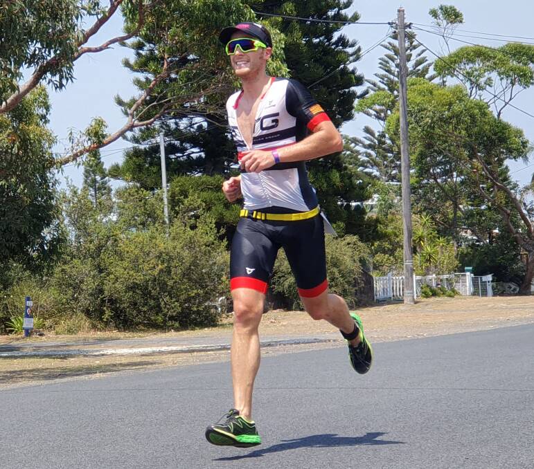 Looking good: Marc Rebenaque finishing the run leg of the Standard Distance race at Callala Triathlon Festival. More than 800 competitors took part over the four events. Photo: Hew Colless