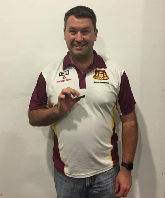 Nick McInerney with his Group Seven Referees Association life membership badge.
