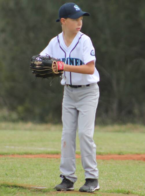 Practice makes perfect: Noah Tagliabracci shows his pitching skills for the Mariners under 14 travelling side. The team heads north to take on Cardinals on Sunday.