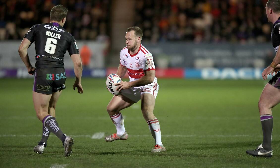 Hull KR's Adam Quinlan goes on the attack against Wakefield. Photo: Tony Foster