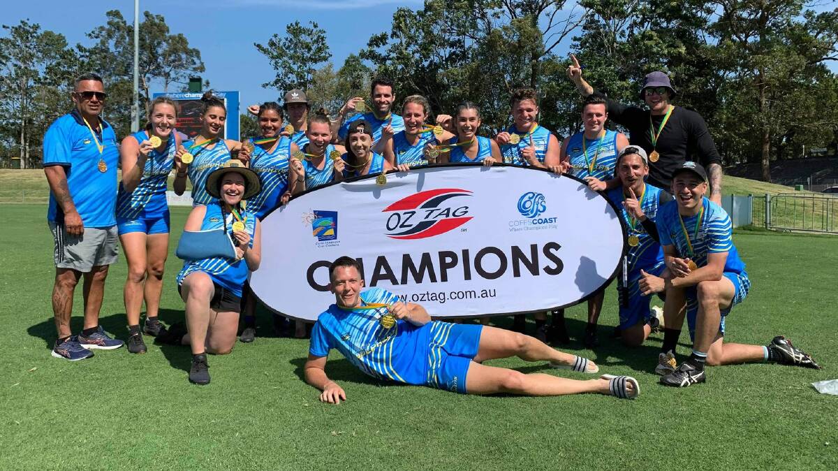 Cheyanne Hatch (back row, second from left) and her victorious East Coast Dolphins team. Photo: Australian Oztag
