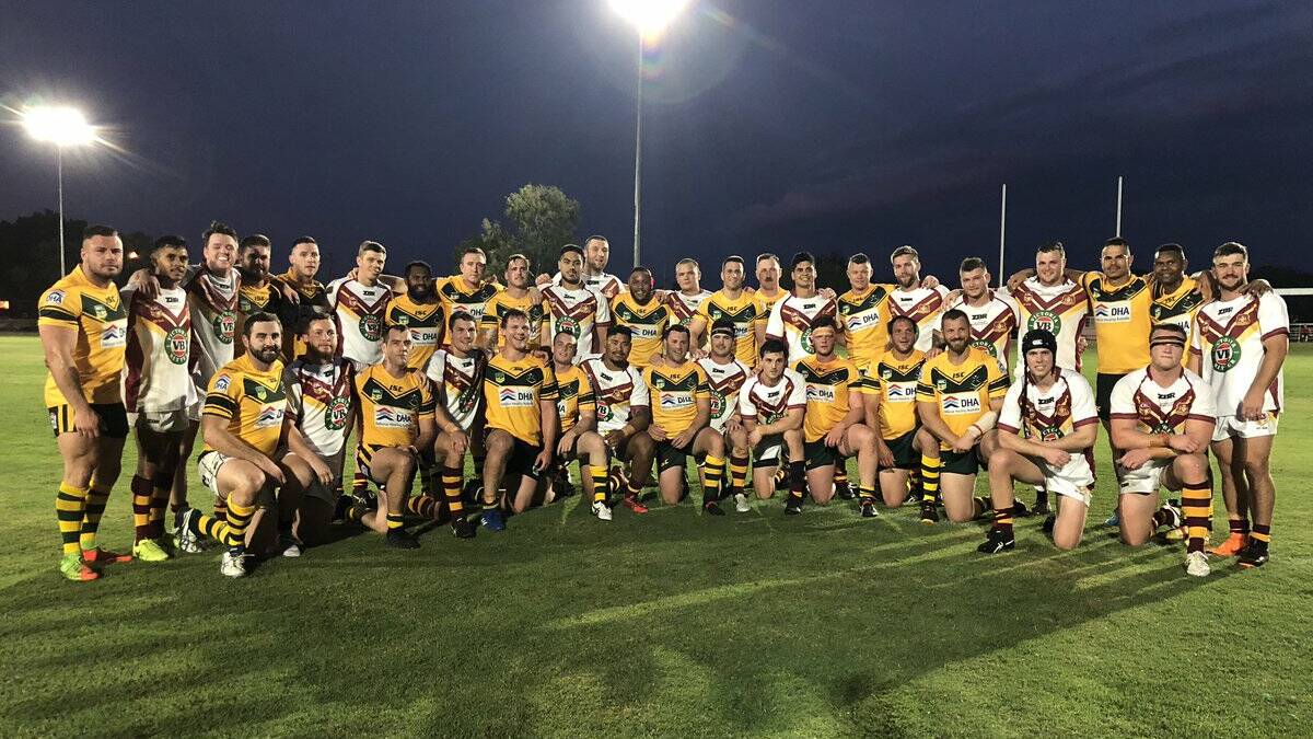 The Country under 23s side and the Australian Defence Force side after the game. Photo: CRL