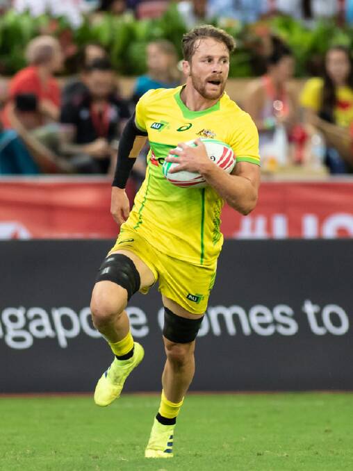 Tom Connor makes a run for Australia at last year's Singapore Sevens. Photo: Mai Groves