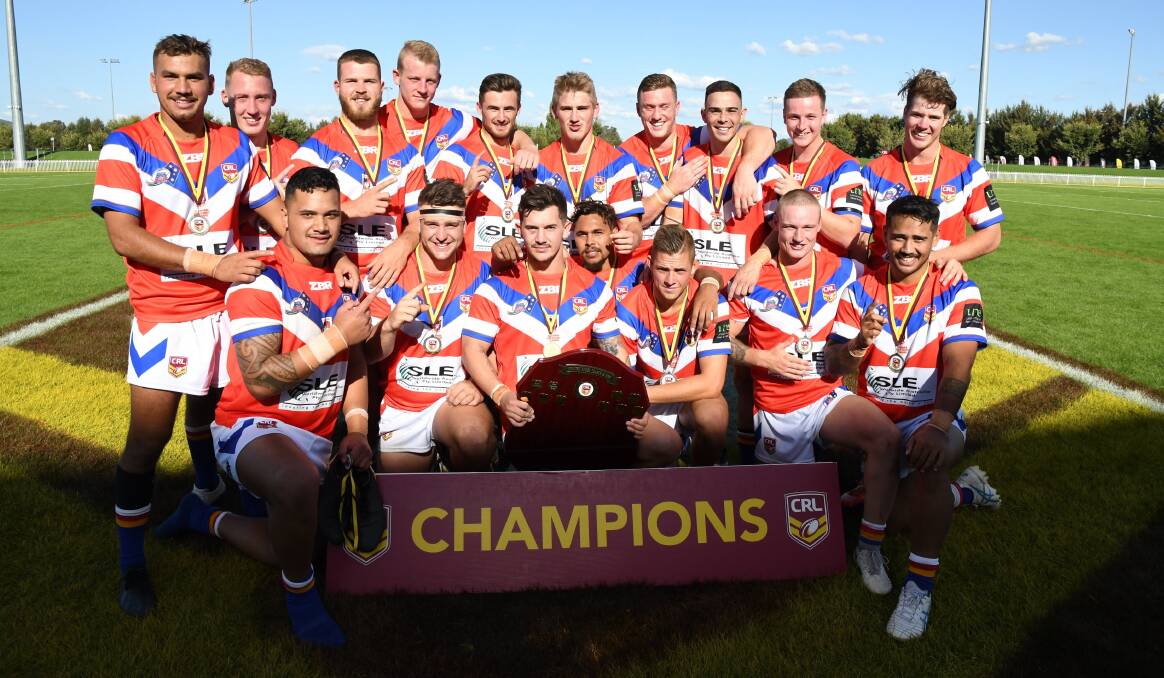 The under 23s Dragons side after their grand final win. Photo: SAM PASFIELD