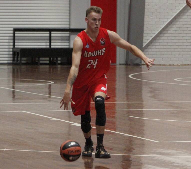 Illawarra Hawks' Harry Morris top-scored with 17 points in Saturday's against the Maitland Mustangs. Photo: Riley Giles