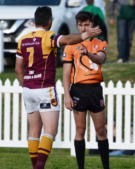 Matt Carroll and Michael Booth having a discussion at Ron Costello Oval. Photo: GREG RIGBY SPORTS PHOTOS
