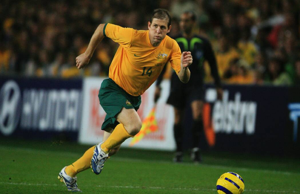 Scott Chipperfield in action for the Socceroos. Photo: Tim Clayton