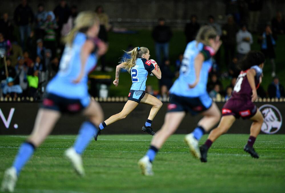 Teagan Berry accelerates towards the tryline while playing for the NSW under 18s side. Photo: NRL Imagery