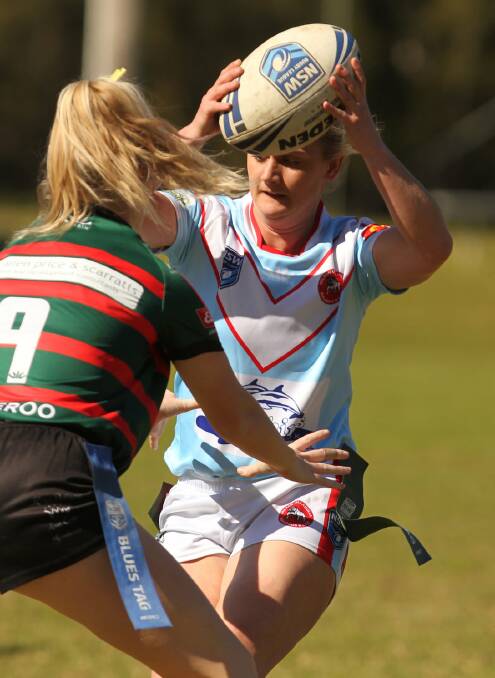 Milton-Ulladulla's Olivia Patterson tries to avoid being tagged by a Jamberoo's Alana Stortz. Photo: David Hall