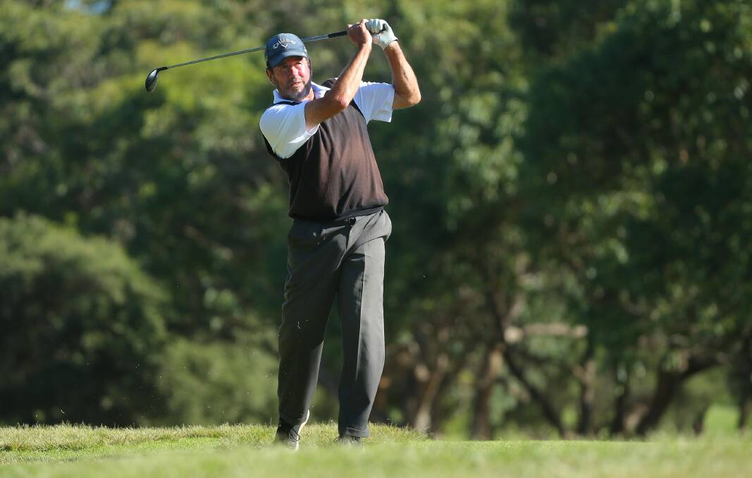 Shoalhaven Heads' Ian Asbury plays a shot during the opening round of the 2021 NSW Senior Amateur Championship. Photo: David Tease