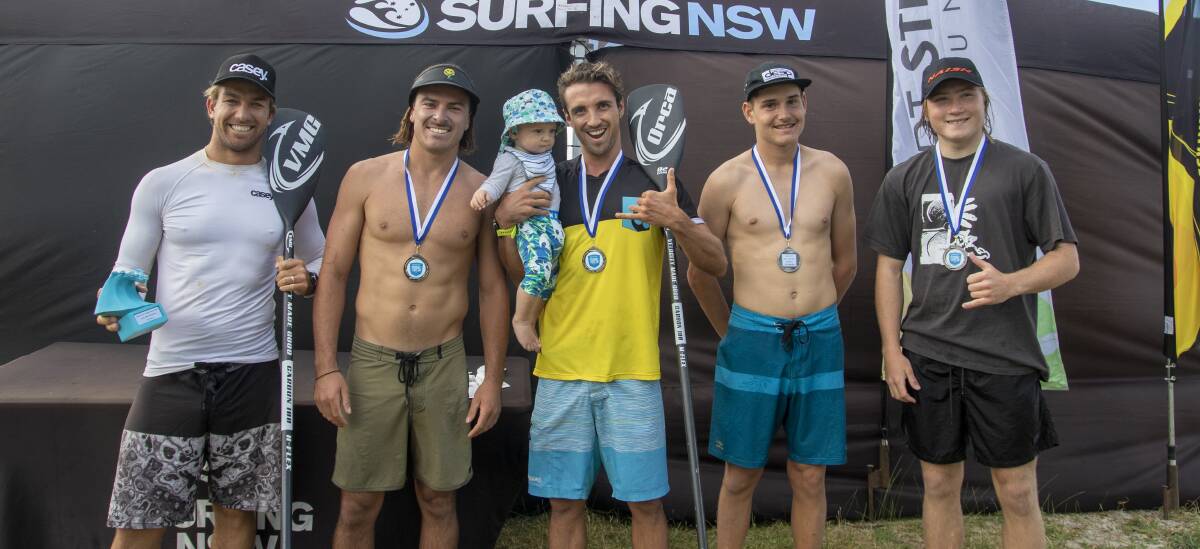 Nathan Cross (second from left) on the open men's marathon podium. Photo: Josh Brown/Surfing NSW