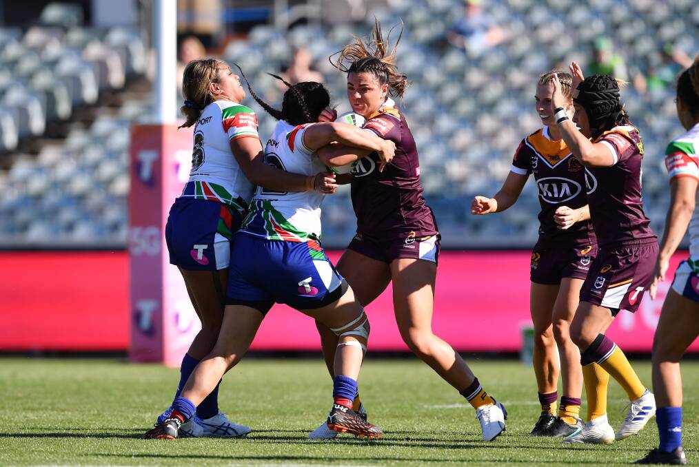 Cobargo's Millie Boyle takes a hit-up for the Broncos against the Warriors in round one. Photo: NRL Imagery/Robb Cox