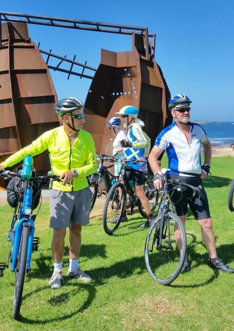 John Van Duin, Kathy Beckenham, Paul Taylor and Gary Catt have a rest at the Port Kembla Heritage park during a recent Thirroul to Kiama ride.