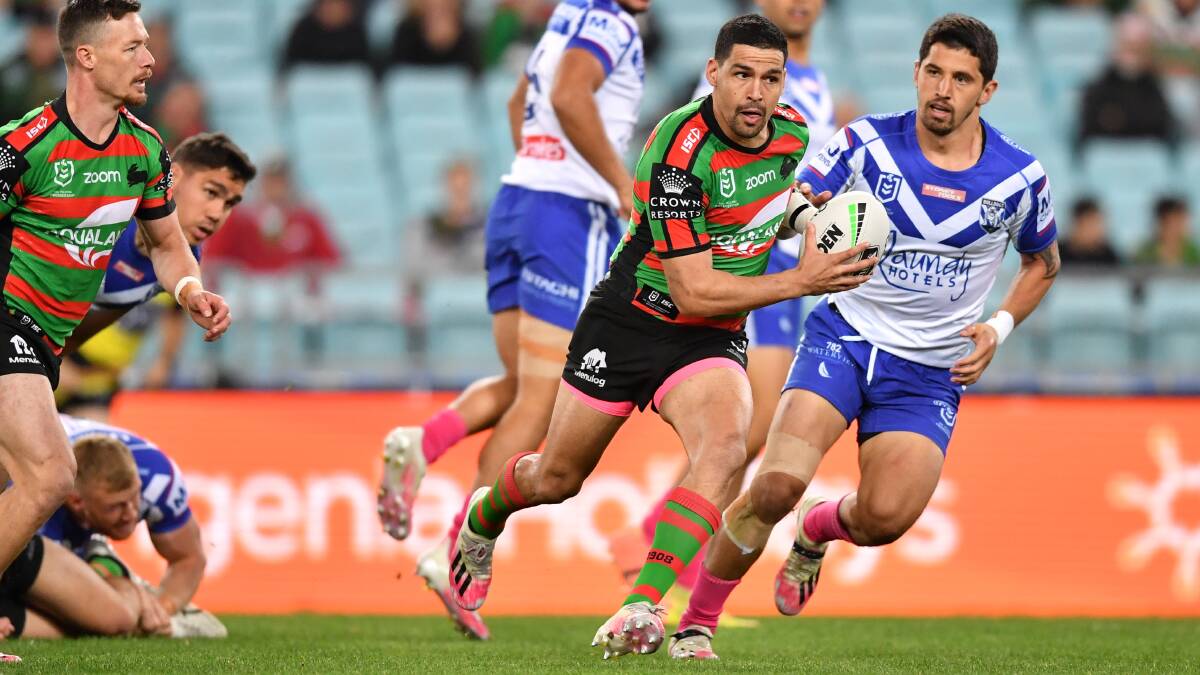 Rabbitohs' Cody Walker goes on the attack against the Bulldogs on Thursday night. Photo: Robb Cox/NRL Imagery