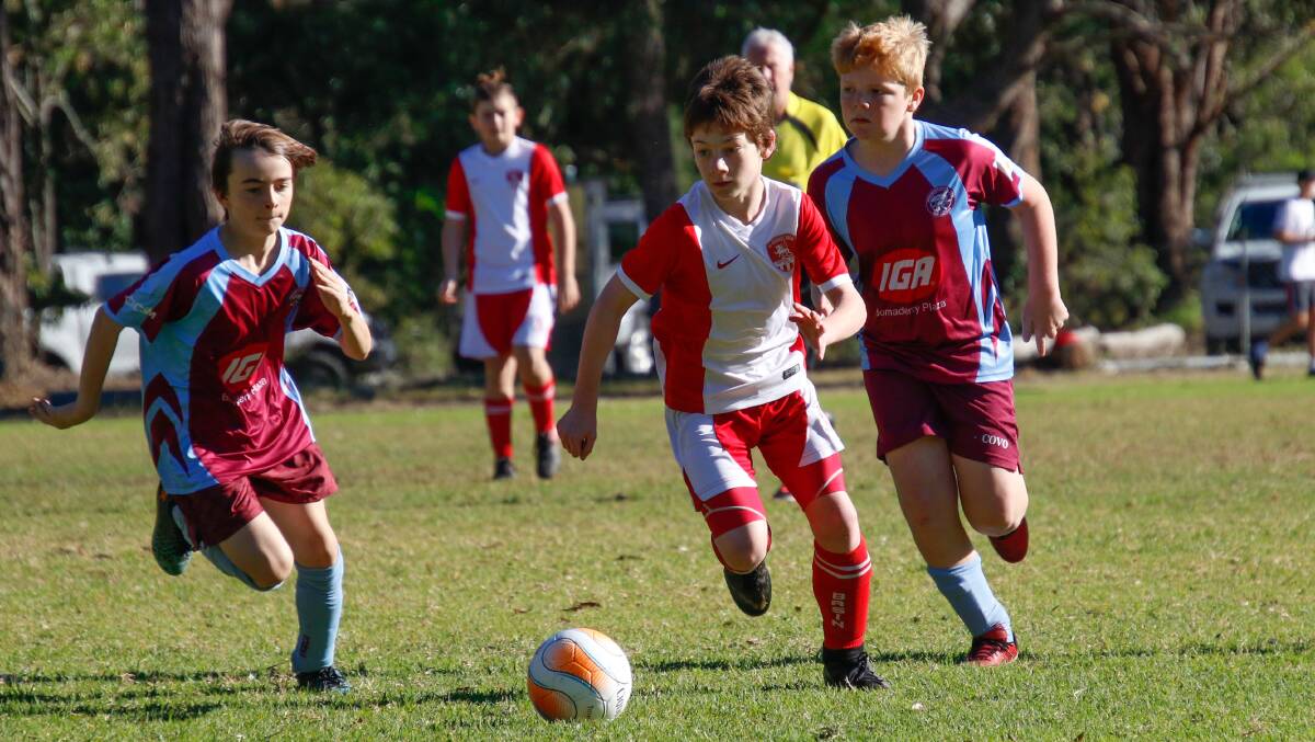 Triple treat: Basin Under 13Bs' Henry Small scored a hat-trick in the game against Shoalhaven Heads-Berry which ended in a 4-all draw. 