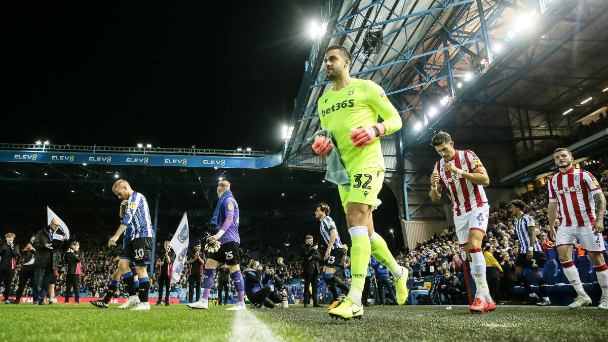 Adam Federici and his Stoke City side run onto the field against Sheffield Wednesday. Photo: Phil Greig