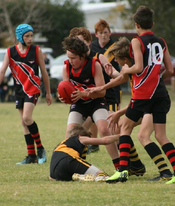 Bay and Basin's Oliver Driscoll in action against Bomaderry. Photo: Adam Clerget 