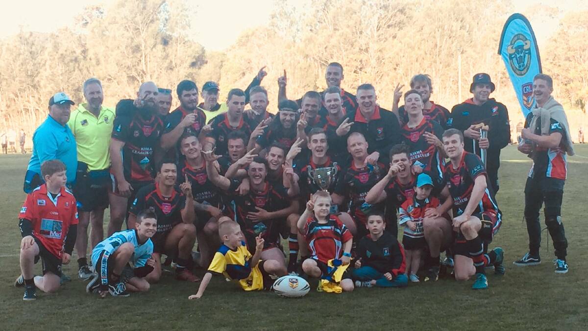 Marc Laird and his Knights side after winning the 2018 reserve grade title. Photo: David Hall