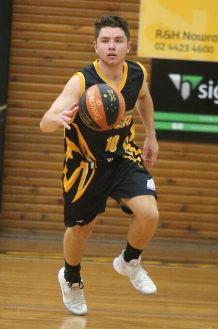 HANDLE: Shoalhaven Tigers guard Billy Campbell scored 15 points against the Canberra Gunners on Saturday. Photo: ROBERT CRAWFORD