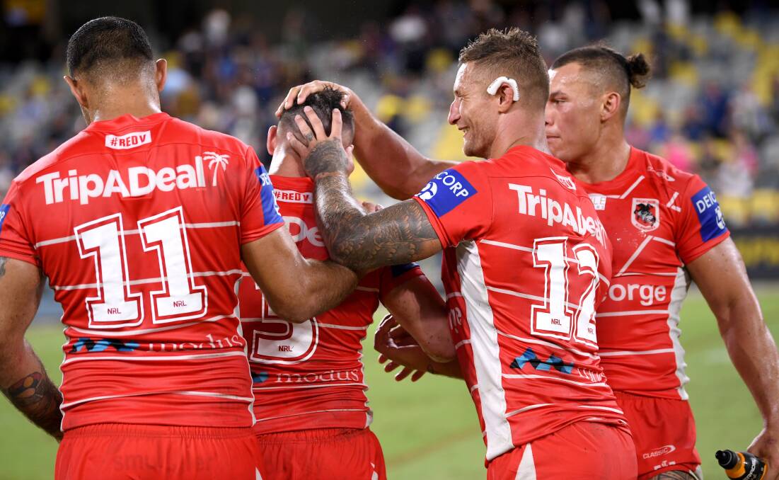 Gerringong's Tariq Sims (second from right) and his Dragons teammates celebrate on Saturday. Photo: NRL Imagery/Scott Davis
