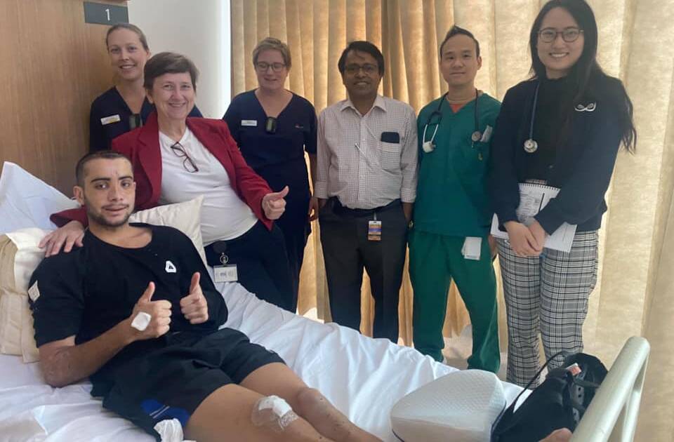 Jack Batson with his doctors and nurses on the day he was discharged from hospital. Photo: Supplied
