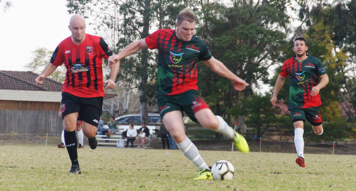 Illaroo's Ross Dunlop loads up for a shot against Shoalhaven United in 2019. Photo: Rach Hall