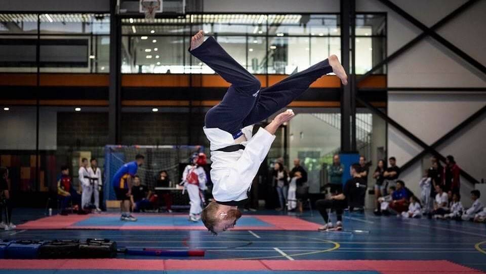 Tim Parkes completes an upside-down tricking manoeuvre. Photo: Supplied
