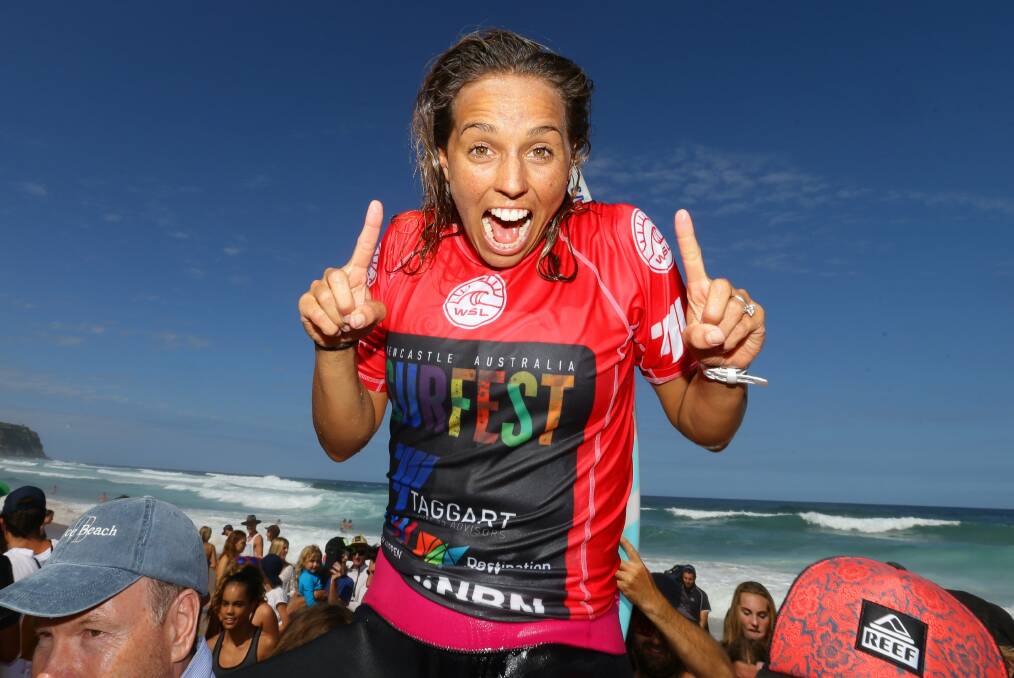 CHAMPION: Sally Fitzgibbons is chaired up the beach after defeating Stephanie Gilmore in the 2016 Surfest women's final to claim her second crown. She defeated Malia Manuel in the 2012 decider. Photo: Jonathan Carroll