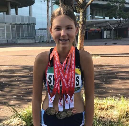 Karlee Symonds with her medals won at the Australian Junior Championships, 2018.
