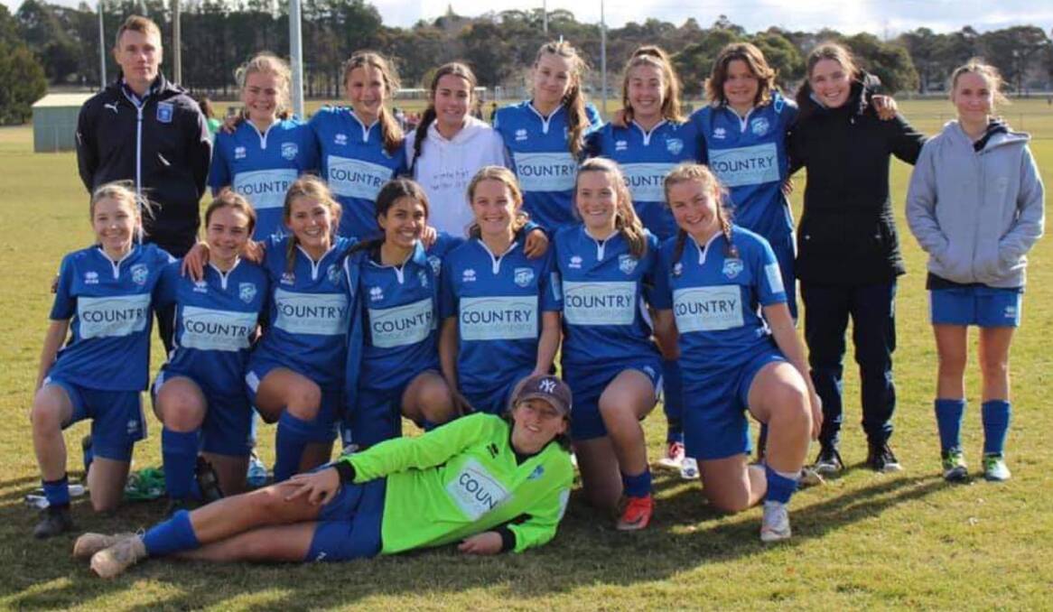 Luke Nolan and his Southern Branch FC's under 17 girls team. Photo: SUPPLIED
