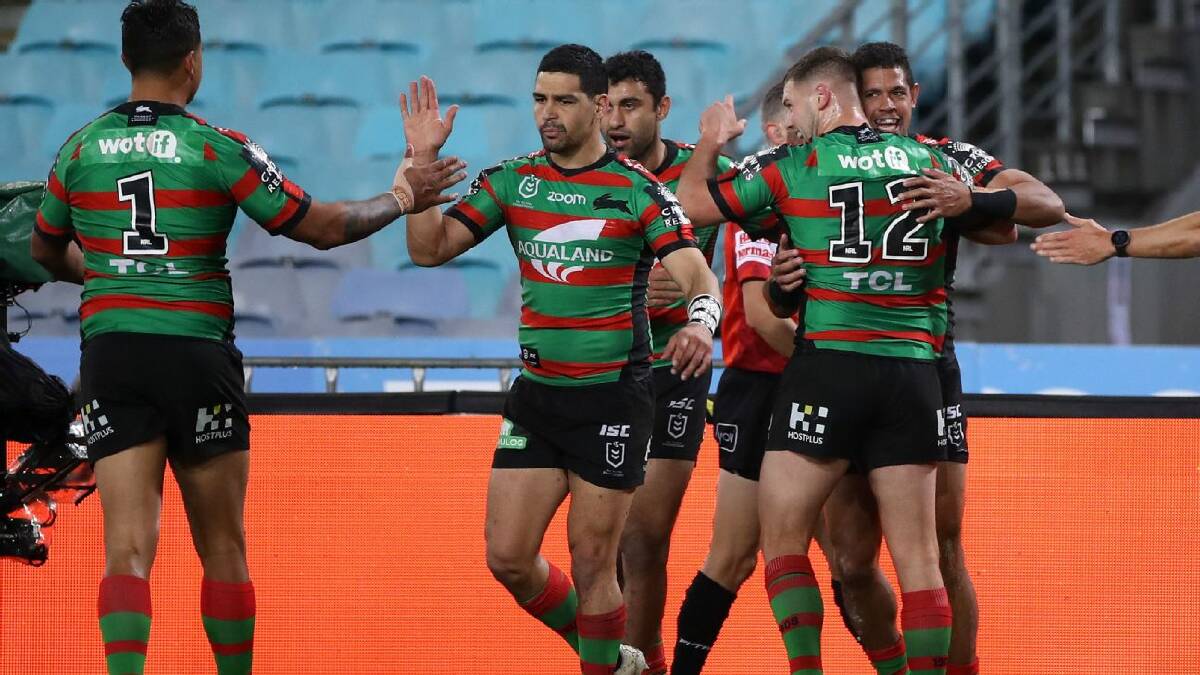 Cody Walker and his South Sydney teammates celebrate a try on Friday night. Photo: Rabbitohs