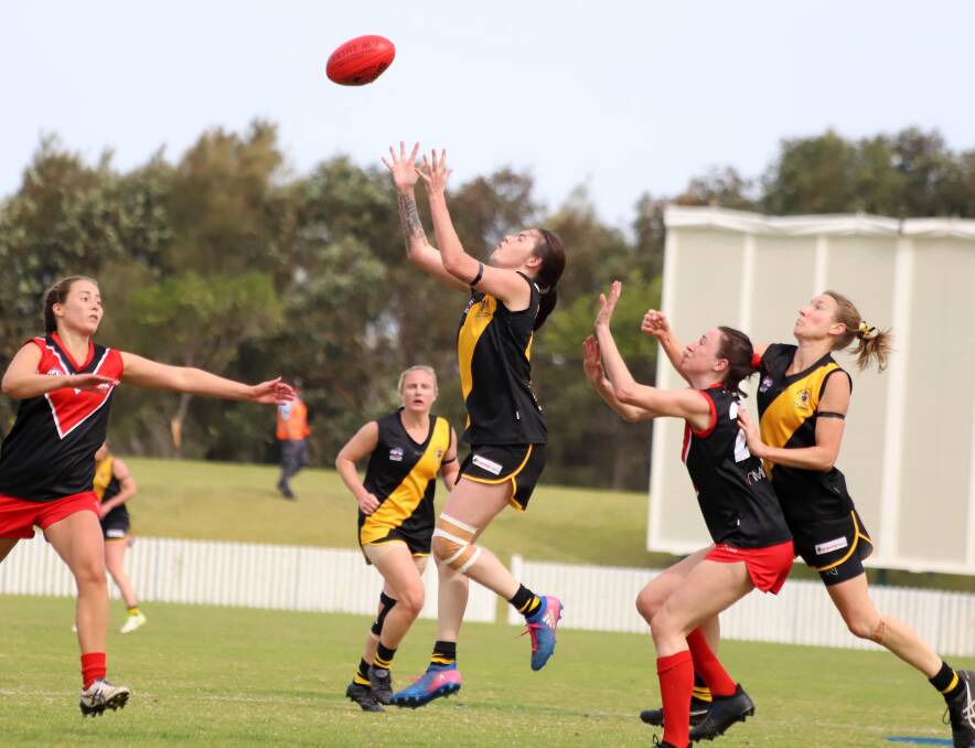 Bomaderry's Simone Seymour sets herself for a mark against the Wollongong Lions. Photo: TEAM SHOT STUDIOS