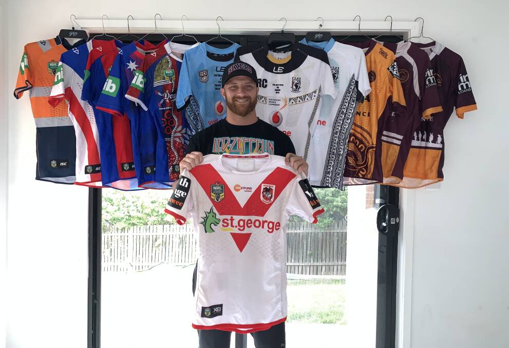 Gerringong's Korbin Sims and the 12 jerseys he auctioned off. Photo: SUPPLIED