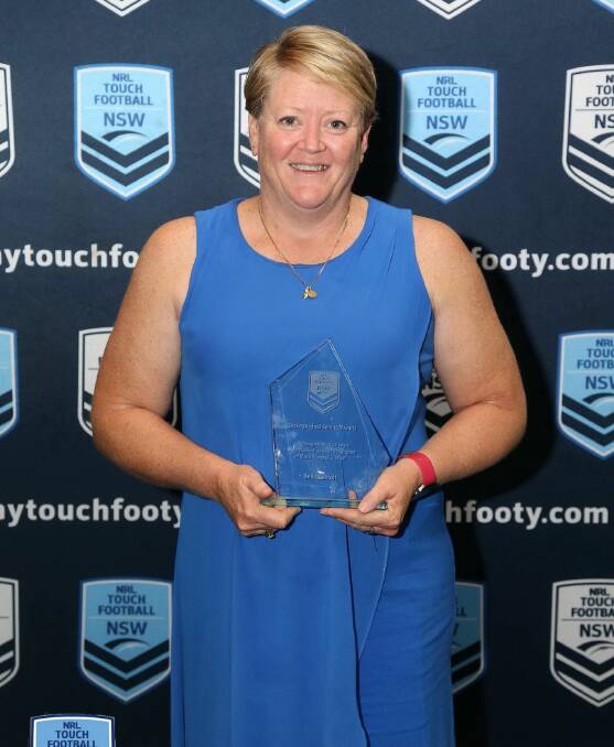 Belinda Holt with her NSW Touch Distinguished Service Award. Photo: JASON KIRK PHOTOGRAPHY