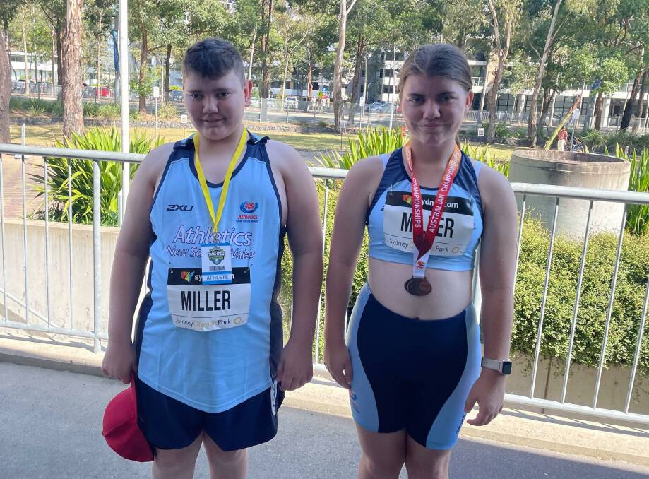 Nowra Athletics Club's Kynan and Akala Miller with their medals. Photo: Supplied
