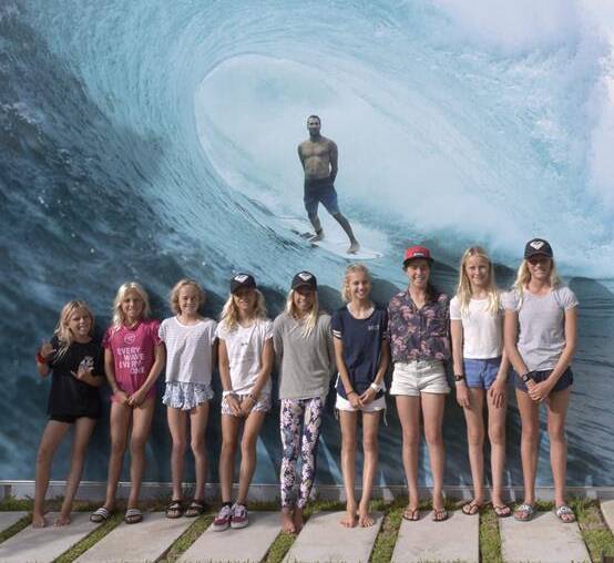 Keira Buckpitt (fourth from left) and the other girl participants of the Woolworths Surf Camp. Photo: Surfing Australia/Nikon
