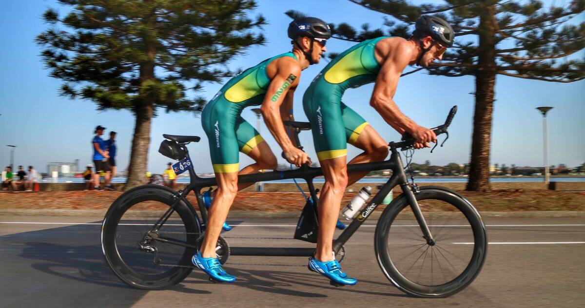Jonathan Goerlach and Sam Douglas compete for Australia at the recent Newcastle OTU Paratriathlon Oceania Championships. Photo: SUPPLIED