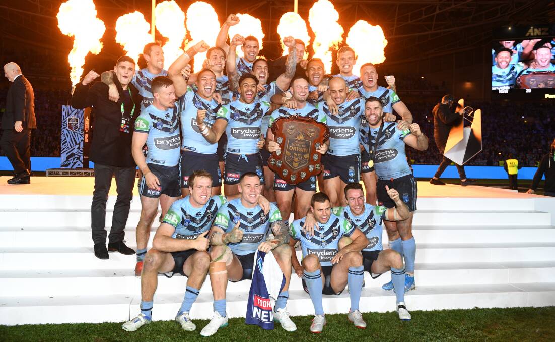 Tariq Sims (back row, third from right) and his NSW Blues team mates after State of Origin game three. Photo: Dan Himbrechts