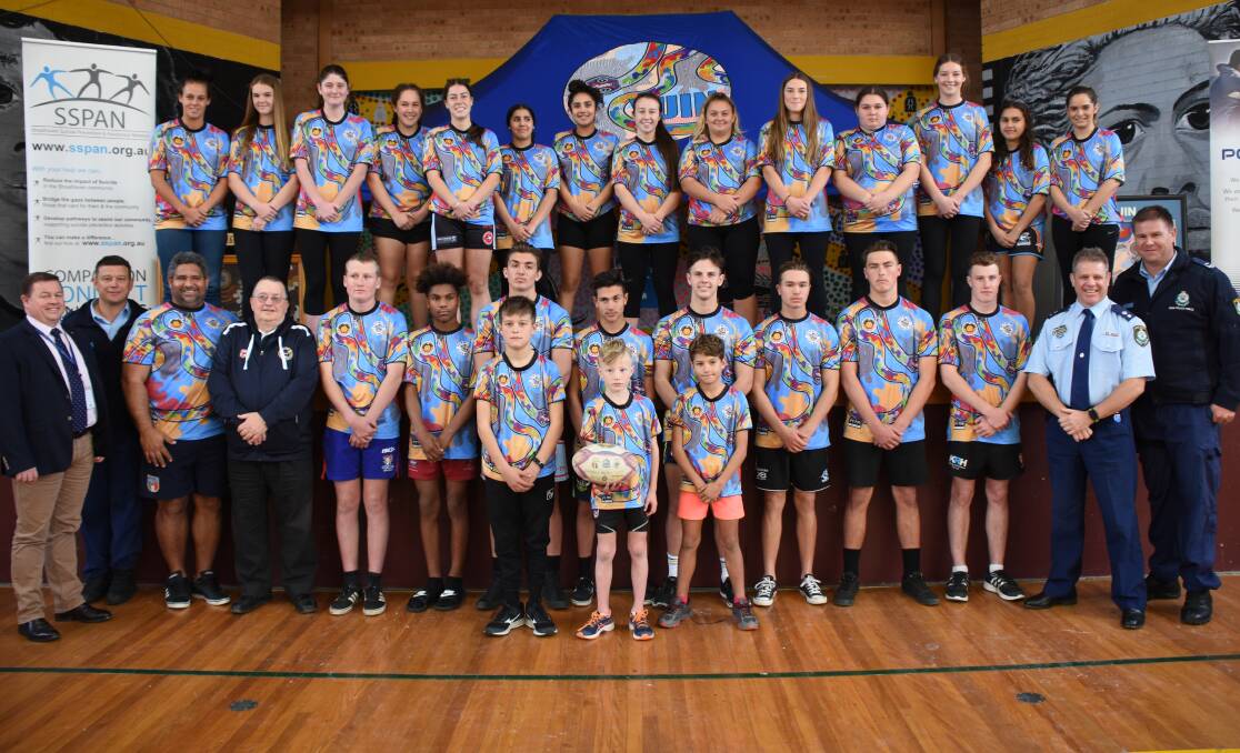 PRIDE IN THE JERSEY: The two 2018 YUIN Snakes squads at Thursday's launch at the Nowra PCYC. Photo: COURTNEY WARD