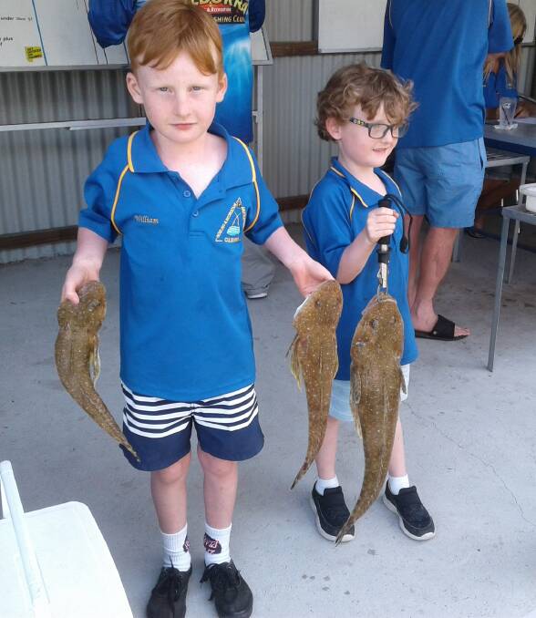 Ben and William Dunn with their flathead.