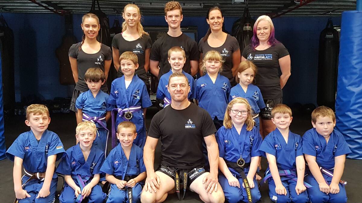BIG FUTURES: Southern Fitness and Martial Arts Centre Bomaderry's advanced little ninjas, with their instructors, following their recent successful gradings.