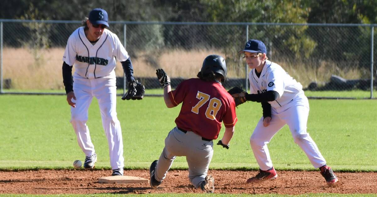 Mariners' Cameron Goulden making the ragout with Dan Miranda backing up in fifth grade on Sunday. Photo: Tracy Provest