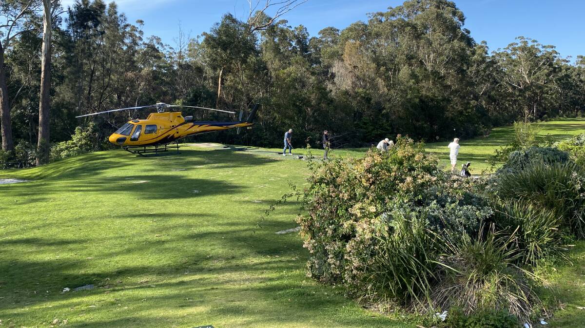 Golfers arriving by helicopter at Mollymook. Photo: Supplied