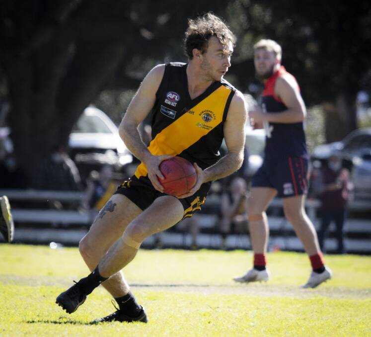 Bomaderry's Lachlan Hunt controls the ball against Nowra-Albatross in an AFL South Coast fixture. Photo: Team Shot Studios