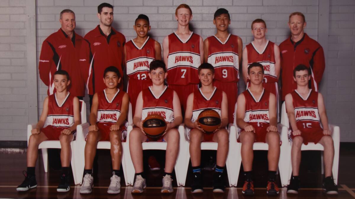 FLYING HIGH: Joshua Costain (front row, third from left), Seth Perman (front row, second from right) and their Illawarra Hawks under 14s team.