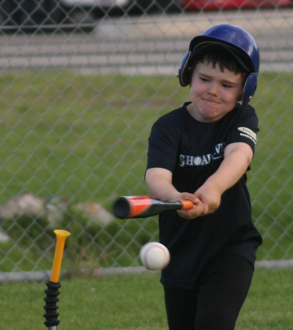 Learning the skills: Heath Almond connects with the ball during Shoalhaven Mariners' Friday afternoon T-ball.