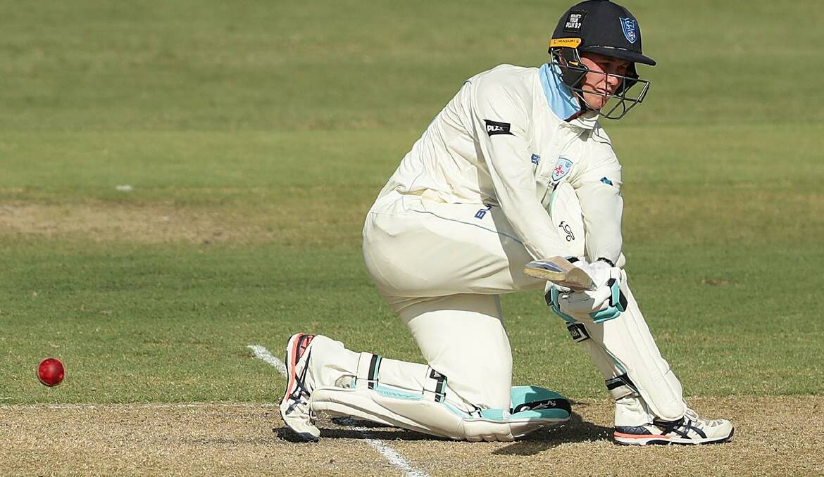 Ulladulla's Matthew Gilkes plays a sweep shot for the NSW Blues' Sheffield Shield side. Photo: Cricket NSW